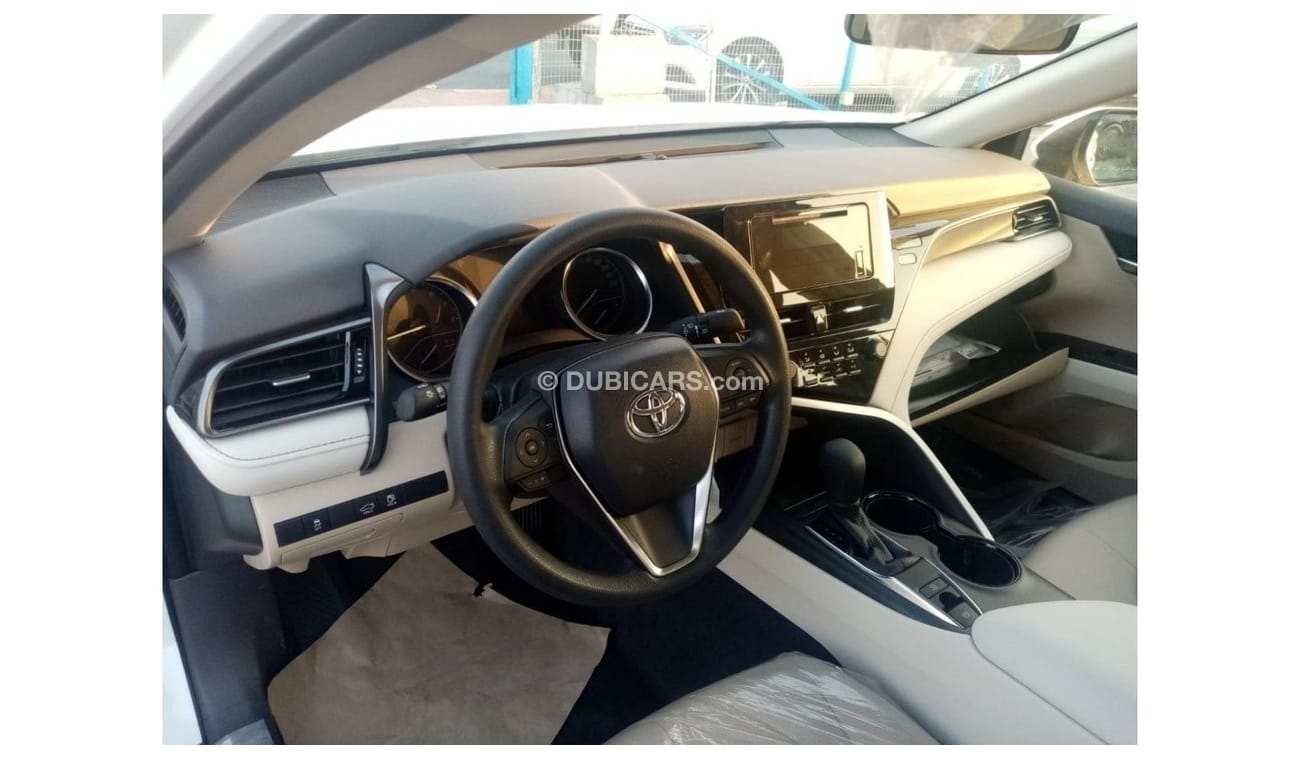 Toyota Camry LE 2022  White inside beige 2.5L petrol 4 Cylinder