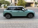 Mini Cooper C 2026 5-Door Ocean Wave Green with White Roof & Mirrors