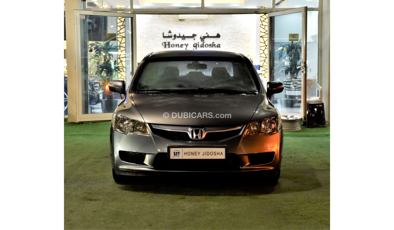 Honda Civic EXCELLENT DEAL for our Honda Civic 1.8 i-VTEC ( 2009 Model ) in Grey Color GCC Specs