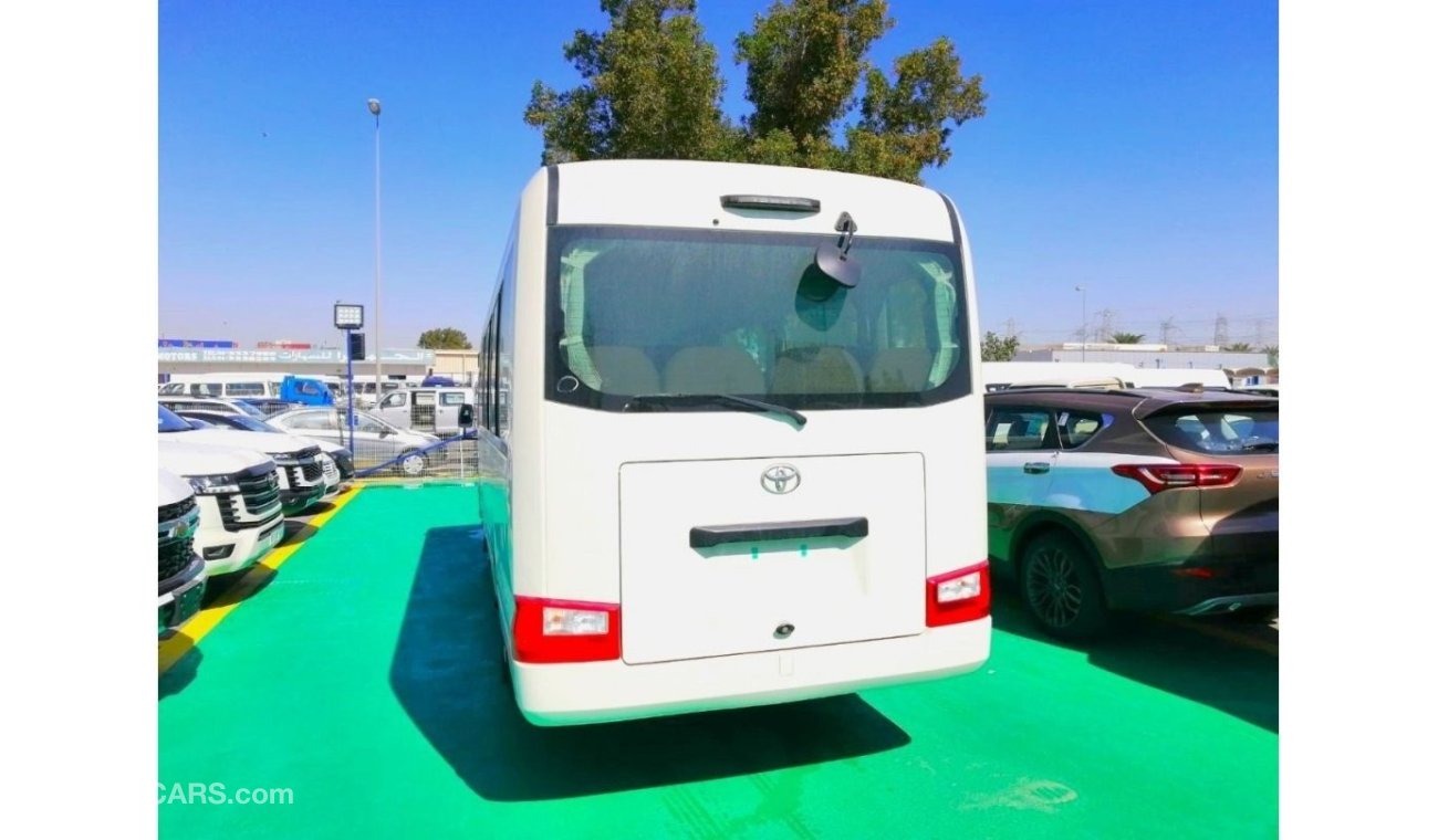 Toyota Coaster 22 seats with fridge and 3 point seat plat