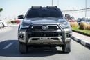 تويوتا هيلوكس The Toyota Hilux is a legendary, durable pickup truck known for its legendary toughness, off-road ca