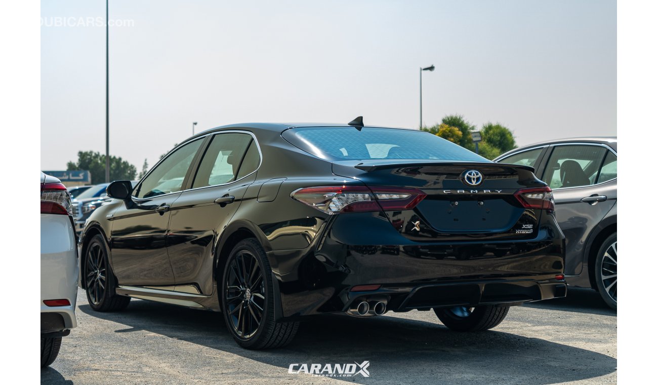 Toyota Camry XSE Hybrid Black / Red Interior