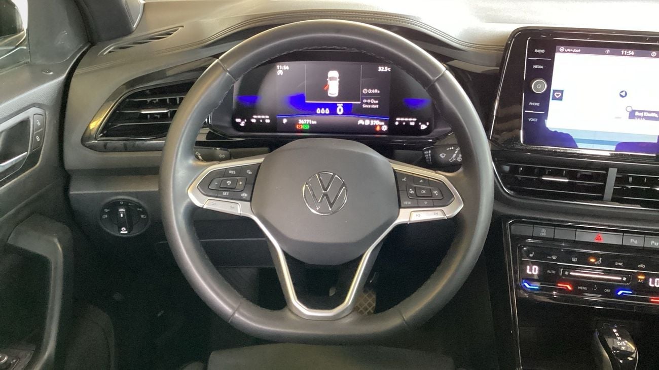 فولكس واجن T ROC 1.4 TSI STYLE | شامل الضمان | 0 ﺪﻔﻋﺓ ﺃﻮﻟﻯ