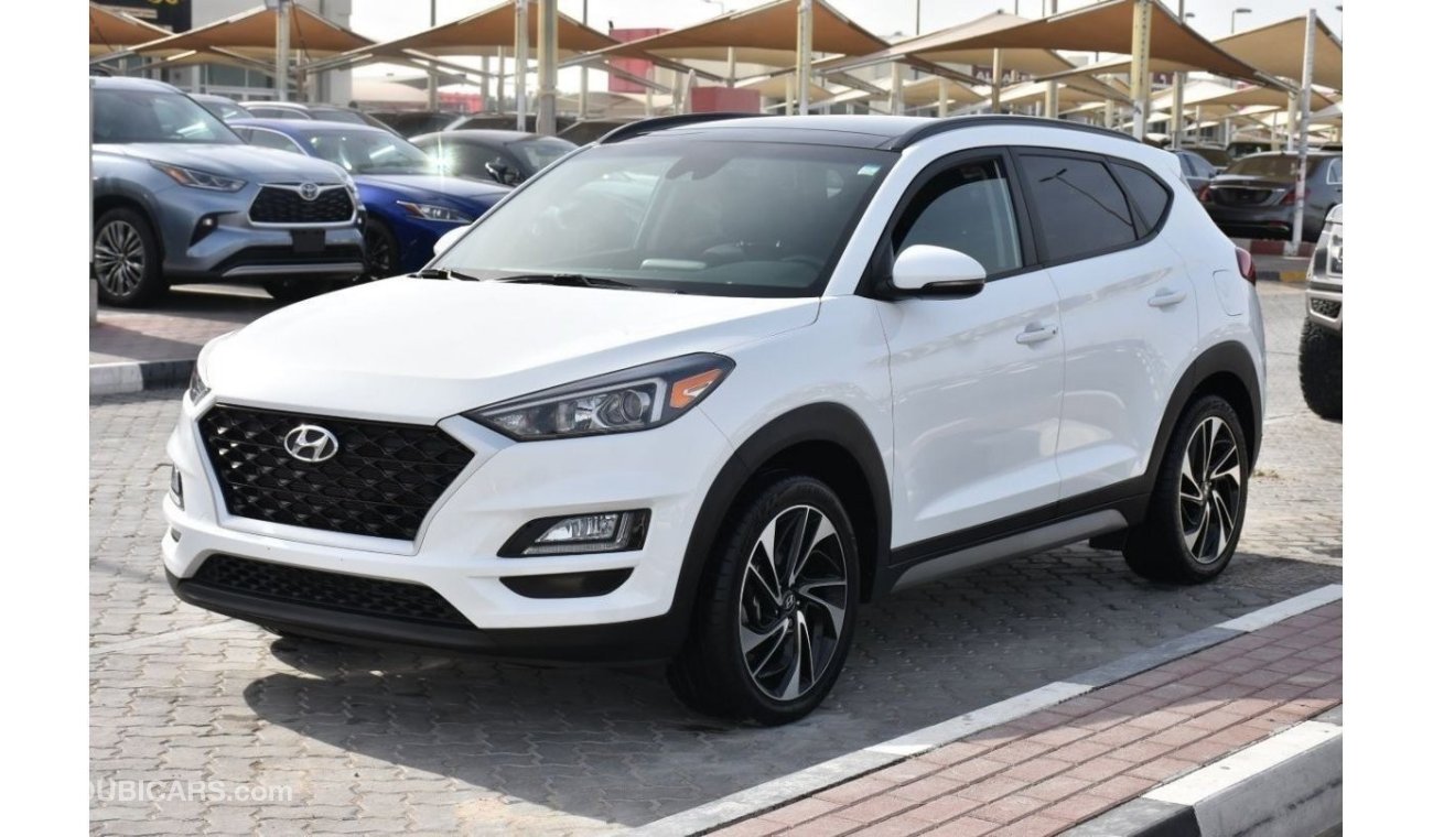 Hyundai Tucson Full Option WITH OPENABLE PANORAMIC ROOF 2.0L V-04 ( CLEAN CAR WITH WARRANTY )