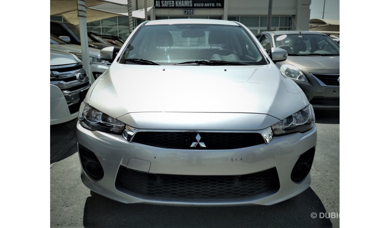 Mitsubishi Lancer 2016 SILVER GCC NO ACCIDENT NO PAIN PERFECT