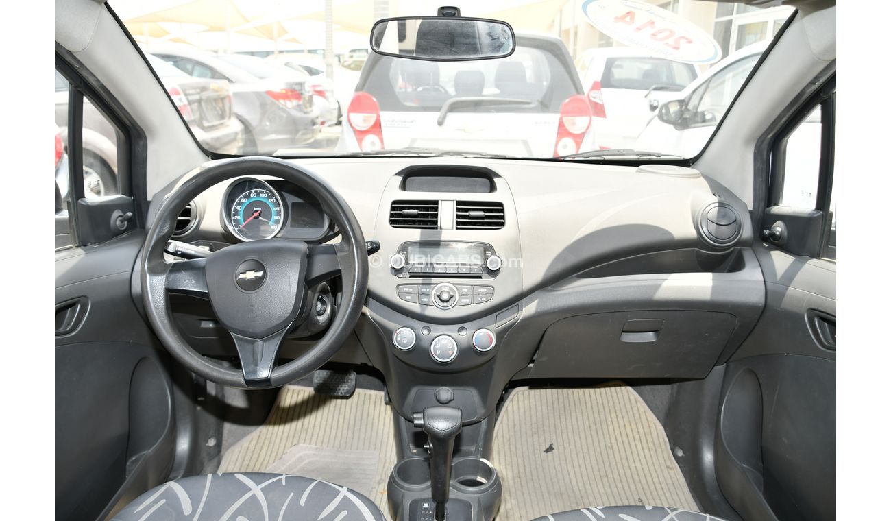 شيفروليه سبارك شيفولية سبارك 2014 ابيض خليجى بدون حوادث بدون صبغ بحالة ممتازة ماشية قليل