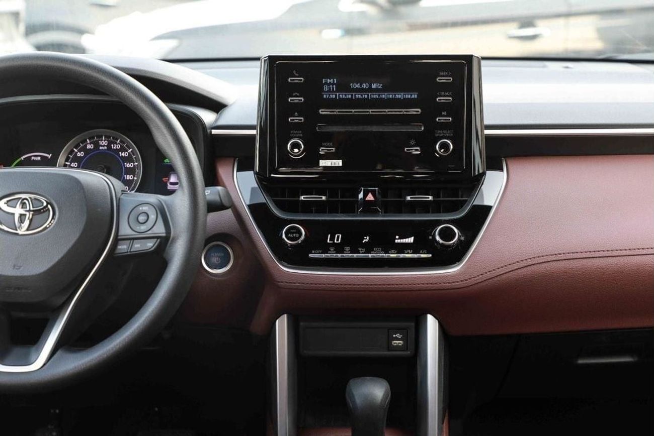 تويوتا كورولا كروس 2024 TOYOTA COROLLA CROSS 1.8 Hybrid MID - Celestite Gray Me inside RED | Export Only