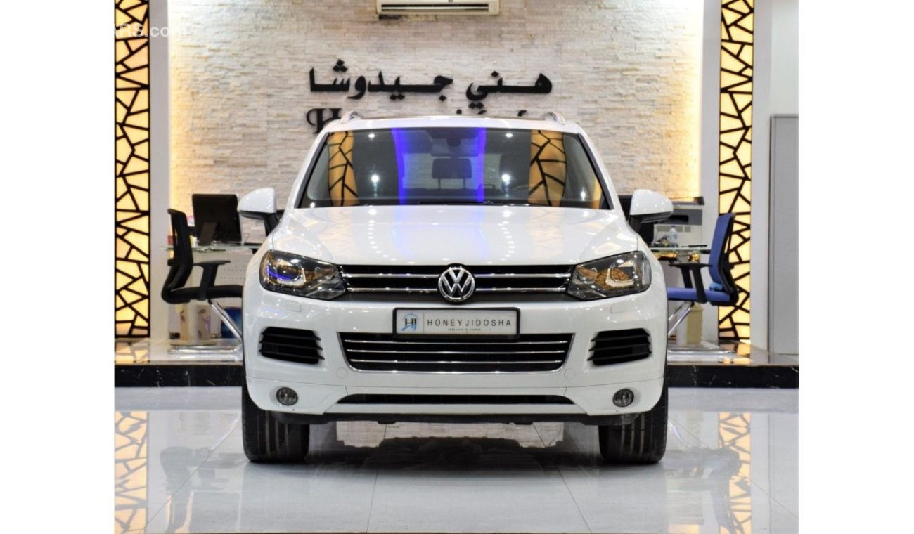 Volkswagen Touareg SEL EXCELLENT DEAL for our Volkswagen Touareg ( 2012 Model! ) in White Color! GCC Specs