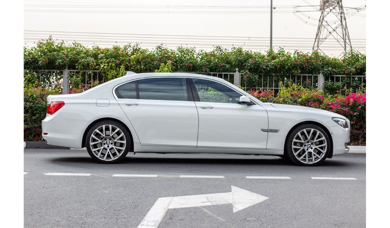 BMW 750Li LI - 2012 - GCC - ASSIST AND FACILITY IN DOWN PAYMENT - 2100 AED/MONTHLY