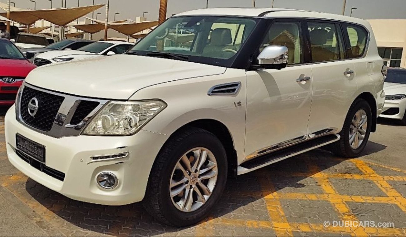 Nissan Patrol 1 فل ابوشن رادار خمس مارات on 1 radar control track electric chairs rear screens five cameras withou