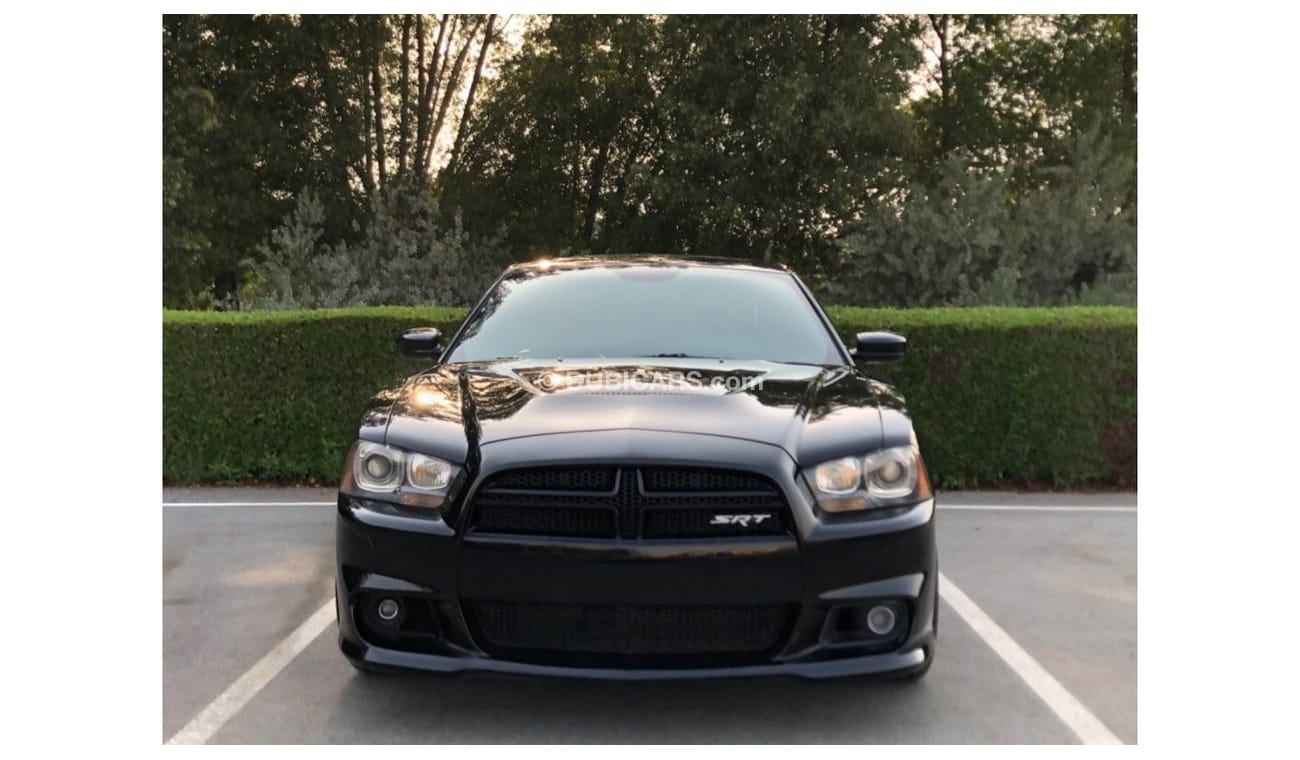 دودج تشارجر SRT8 موديل 2014 خليجي حاله ممتازه من الداخل والخارج فل مواصفات كراسي جلد ومثبت سرعه وتحكم كهربي كامل