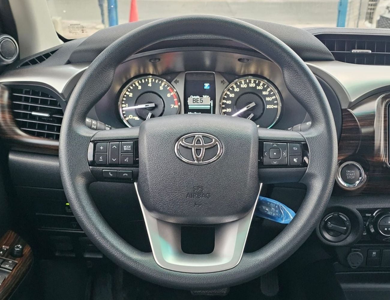 Toyota Hilux TOYOTA HILUX SR5 WIDE BODY DOUBLE CABIN || 2.7L PETROL A/T 4WD | BSM, WINOW VISOR, FOG LIGHTS, WOOD