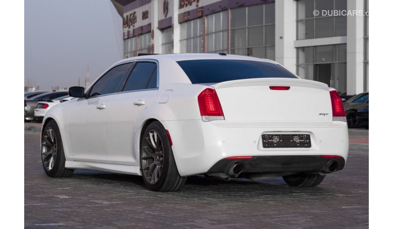 Chrysler 300C SRT8 Chrysler 300 SRT Model : 2015 Mileage : 197,000 km Price : 65,000 dirhams Gulf specifications ,