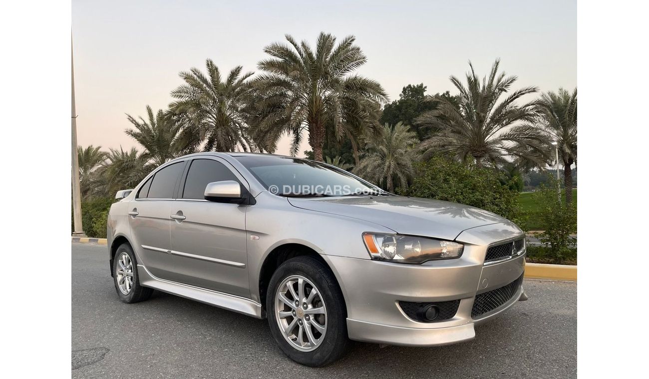 Mitsubishi Lancer MITSUBISHI LANCER 2,0 - GLS- mobile 2014 Excellent Conditio  Very celen car Full automatic Free acci