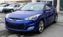 Hyundai Veloster Pre-owned for sale in Sharjah. Blue 2015 model, available at Wael Al Azzazi Sharjah