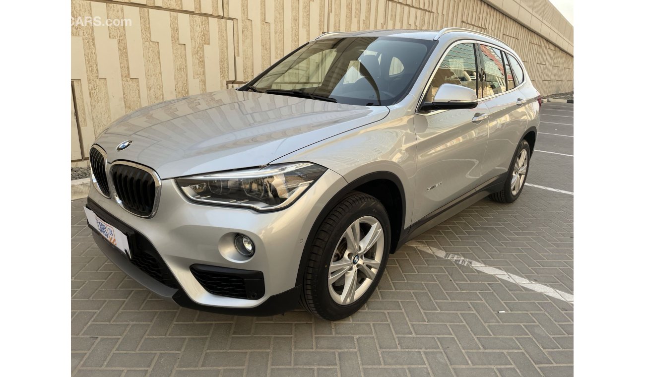 BMW X1 2L | S drive 20|  GCC | EXCELLENT CONDITION | FREE 2 YEAR WARRANTY | FREE REGISTRATION | 1 YEAR FREE