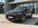 BMW X5 50i Exclusive 4.4L (7 Seater) BMW X5 XDRIVE 50i | 4.4L TWIN TURBO V8 – 450 BHP | 2014 | GCC SPECS