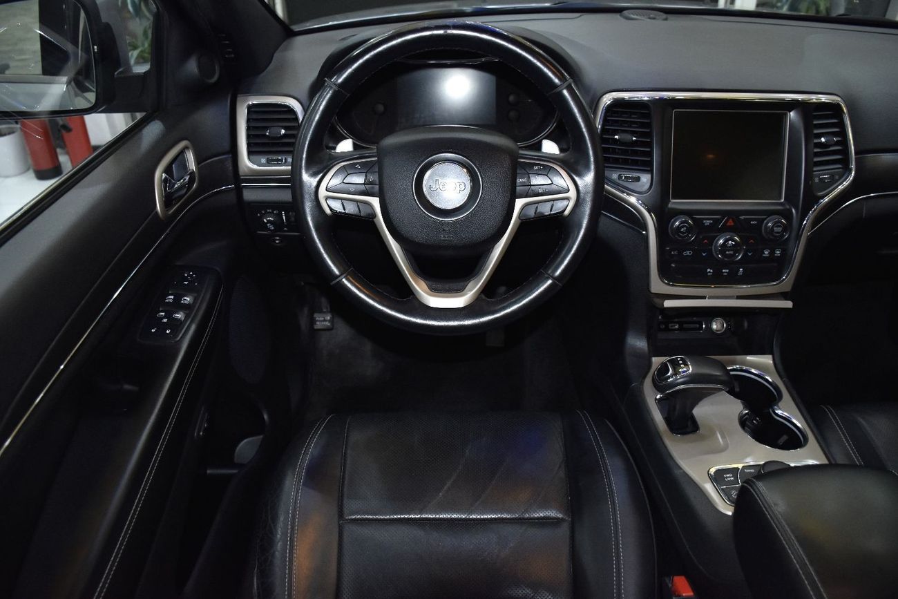 Jeep Grand Cherokee EXCELLENT DEAL for our Jeep Grand Cherokee Limited 4x4 ( 2015 Model ) in Silver Color GCC Specs