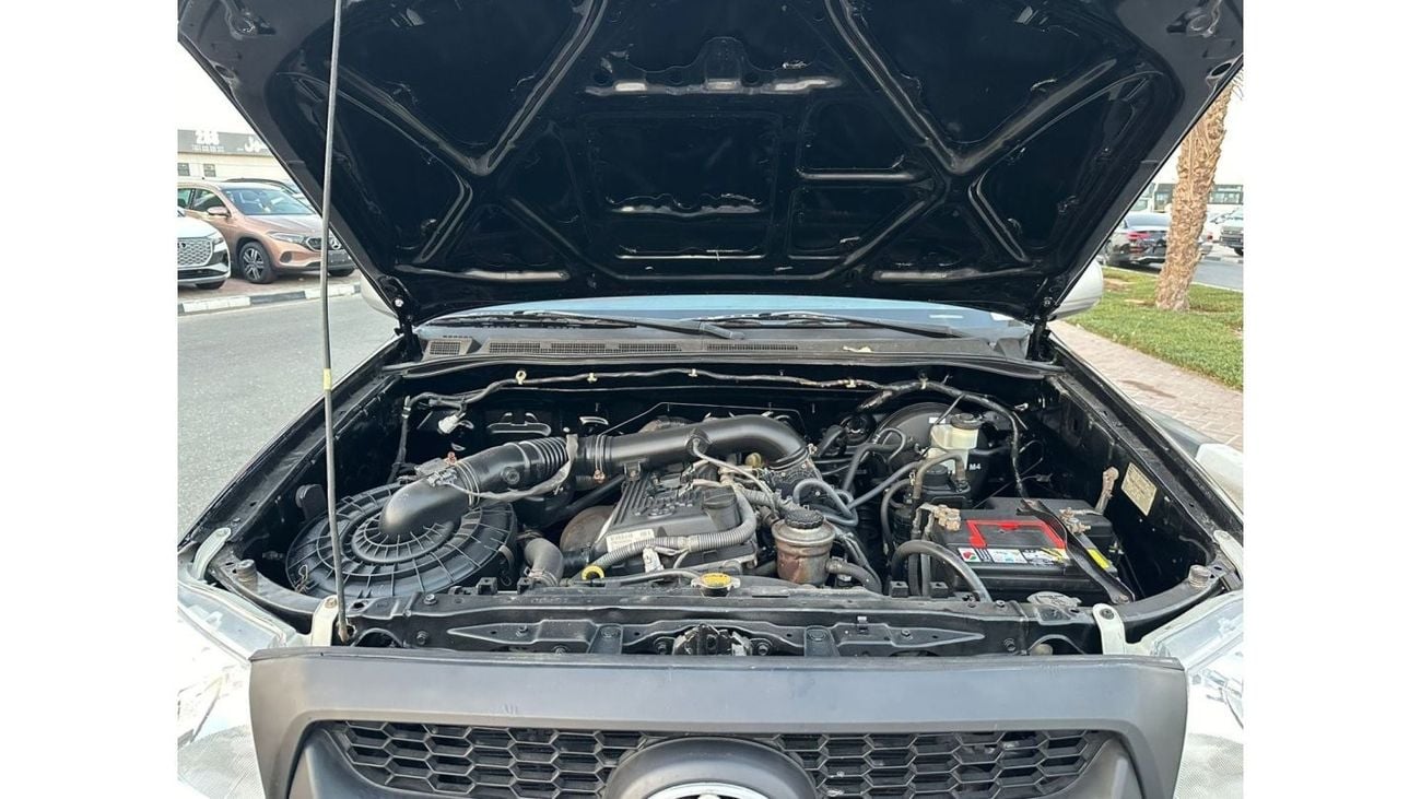 Toyota Hilux DOUBLE CABIN | PREMIUM SPORTS BAR WITH BASKET | 2009 | 2.7L PETROL | LHD | MANUAL | RED INTERIOR