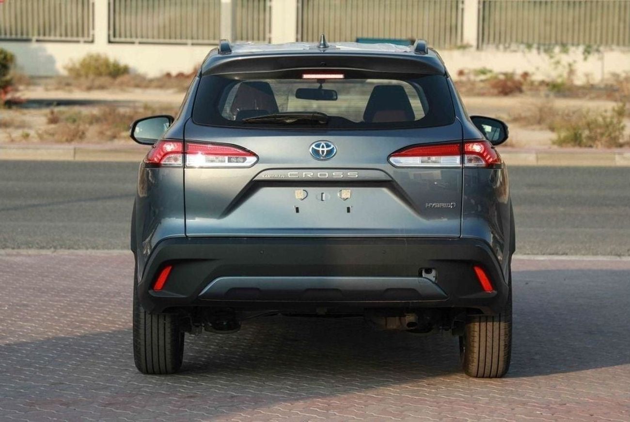 تويوتا كورولا كروس 2024 TOYOTA COROLLA CROSS 1.8 Hybrid MID - Celestite Gray Me inside RED | Export Only