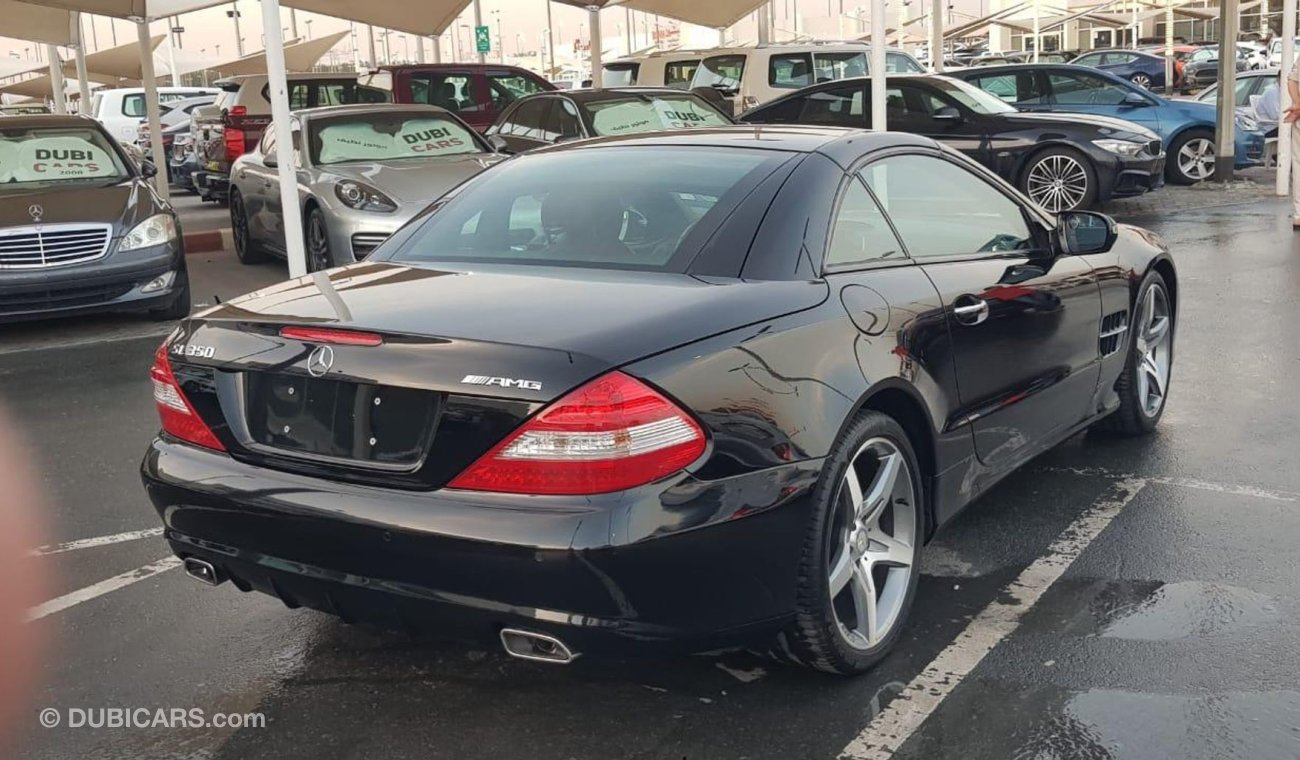 مرسيدس بنز SL 350 موديل 2009 خليجي حاله ممتازه من الداخل والخارج فل مواصفات شيتري وكراسي جلد ومثبت سرعه وشاشه ونفيجشن