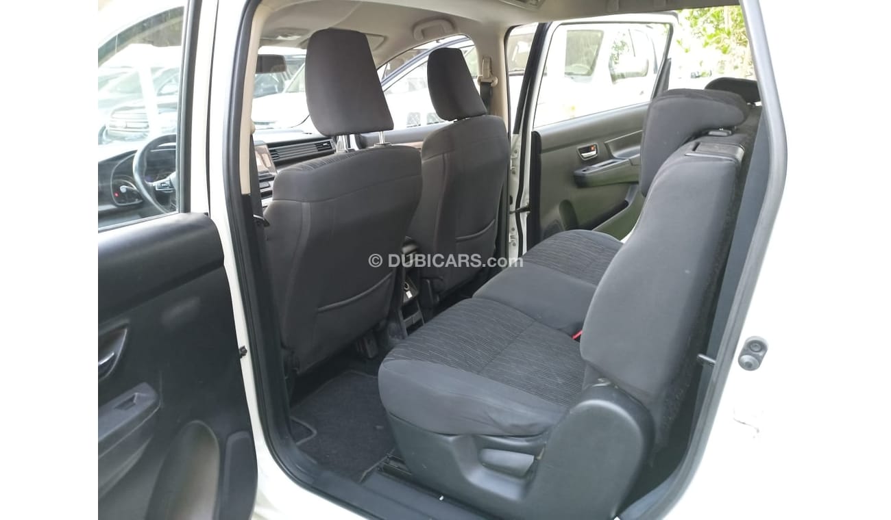 Suzuki Ertiga 2019 model, agency dye, 1600 cc, imprint, white color, rear wing, alloy wheels, air conditioning, wo