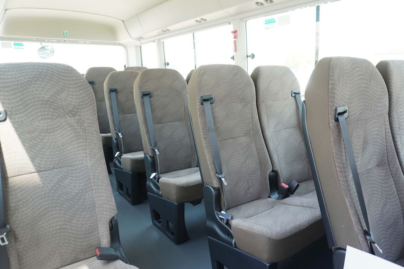 Toyota Coaster ,M/T - 2026