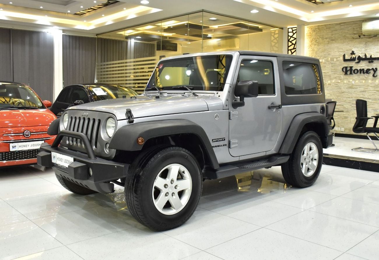 Jeep Wrangler EXCELLENT DEAL for our Jeep Wrangler Sport ( 2016 Model ) in Silver Color GCC Specs