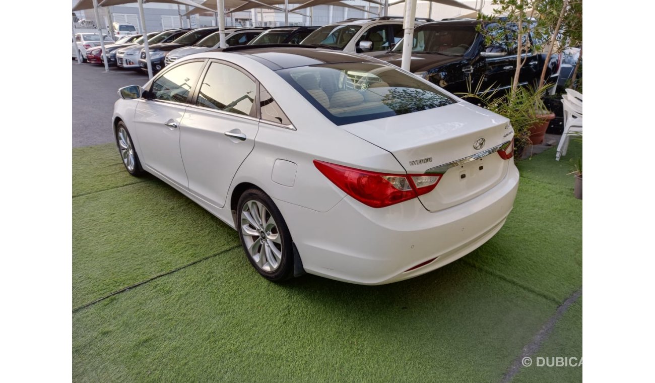 Hyundai Sonata Gulf model 2012, panorama, fingerprint, cruise control, wheels, sensors, screen, rear camera, in exc