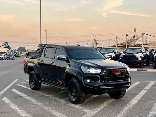 Toyota Hilux SGLX 2021 Toyota Hilux Black Edition - Trunk Cover - 2.7L V4 - GCC - AWD 4x4 - Rear Camera - Le