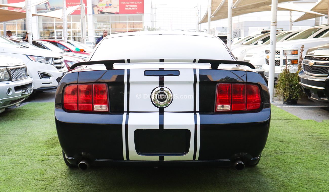 فورد موستانج خليجى كوبيه موديل 2009 لون أسود بحالة ممتازة لاتحتاج لأى مصاريف