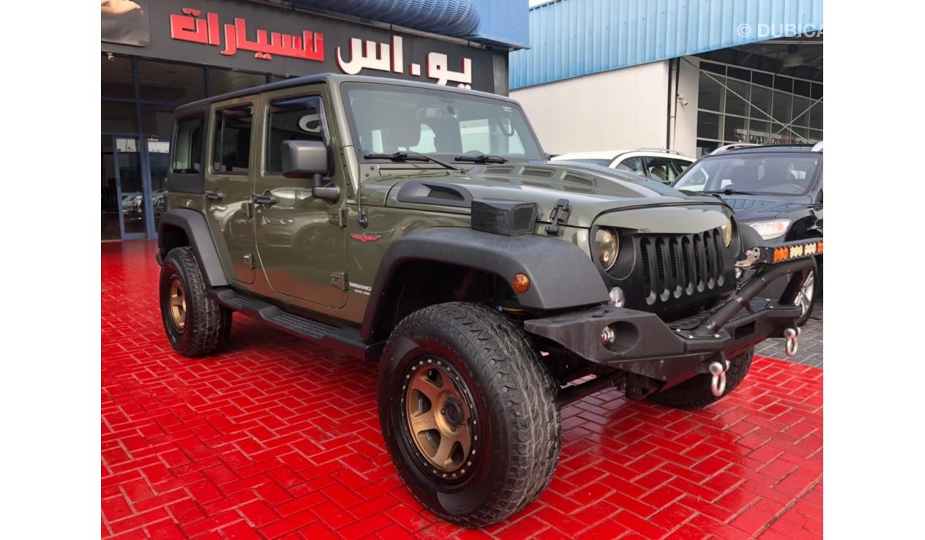 Jeep Wrangler UNLIMITED (MILITARY GREEN) GCC 2015 LOW MILEAGE IN MINT CONDITION