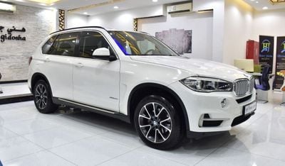 BMW X5 35i EXCLUSIVE EXCELLENT DEAL for our BMW X5 xDrive35i ( 2014 Model ) in White Color GCC Specs