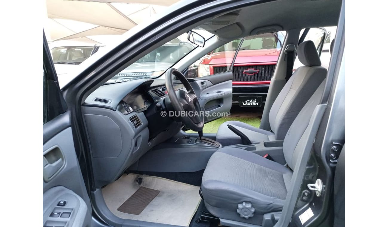 ميتسوبيشي لانسر خليجي 2009 تكييف باورأوتوماتيك سنتر لوك جناح خلفى بحالة ممتازة جدا لاتحتاج الي أى مصاريف