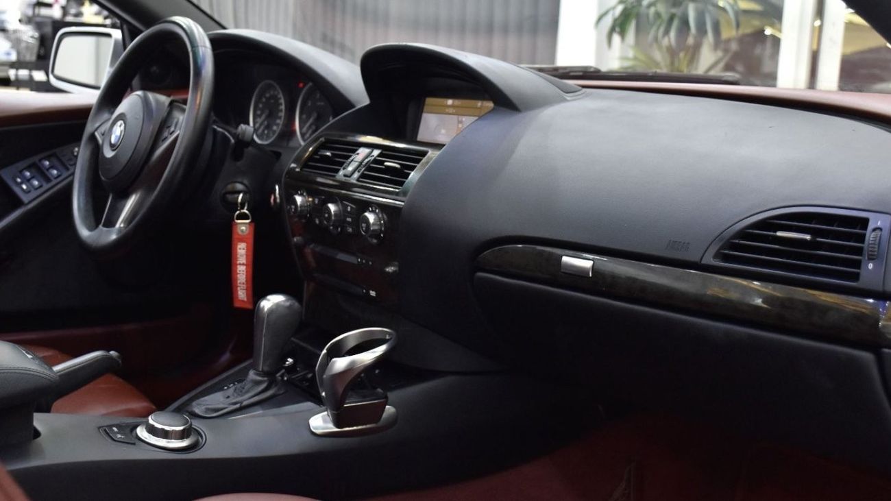 BMW 650i EXCELLENT DEAL for our BMW 650i Convertible ( 2006 Model ) in Silver Color GCC Specs