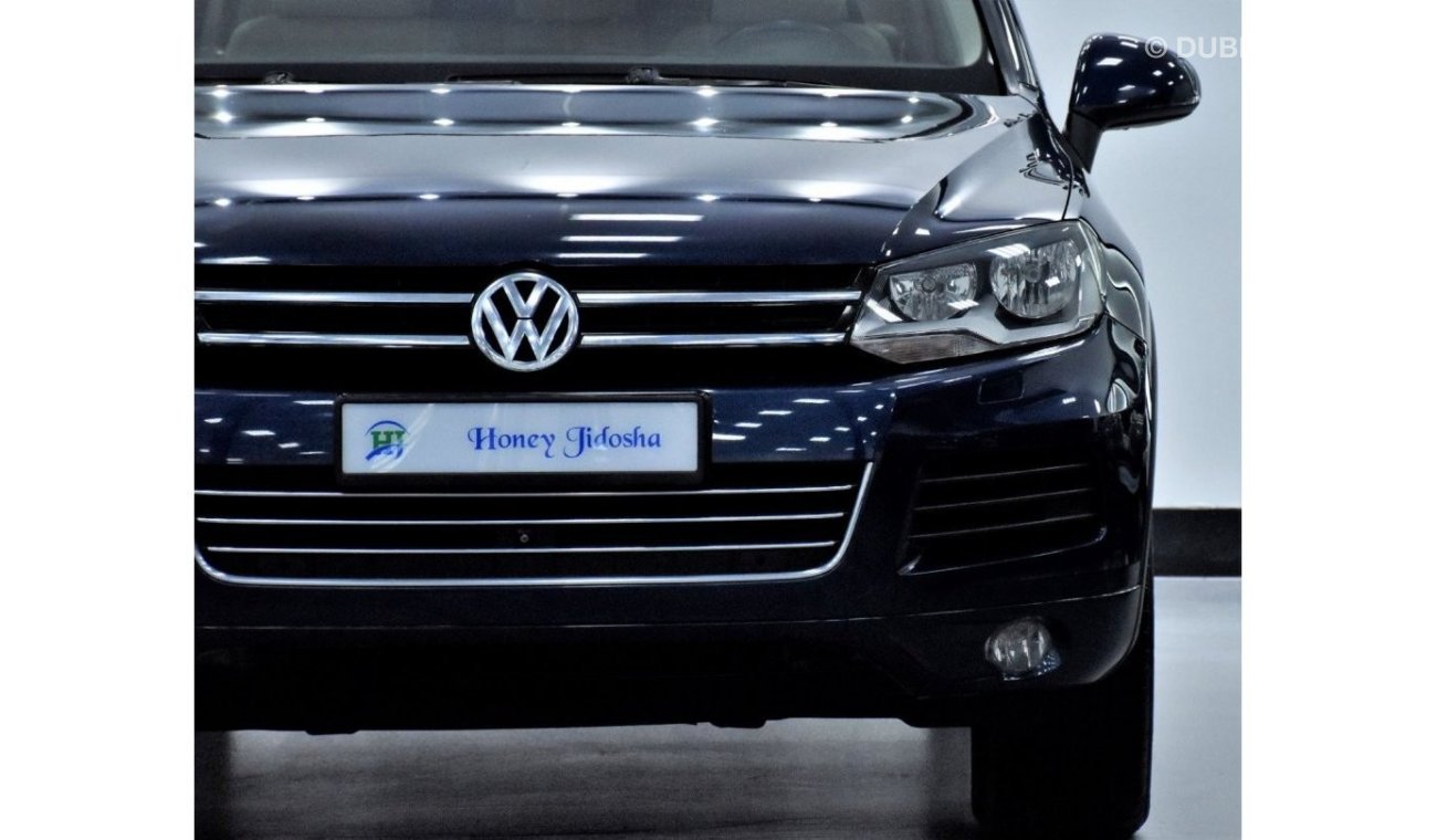 Volkswagen Touareg EXCELLENT DEAL for our Volkswagen Touareg ( 2011 Model! ) in Blue Color! GCC Specs