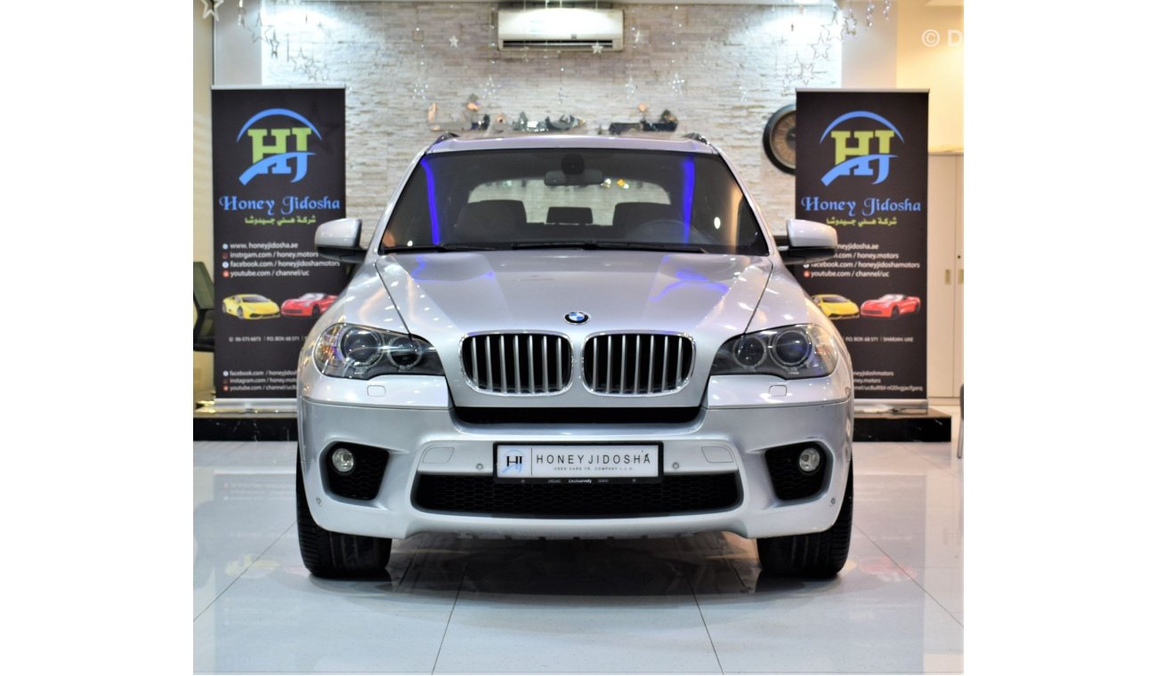 BMW X5 EXCELLENT DEAL for our BMW X5 xDrive50i 2012 Model!! in Silver Color! GCC Specs