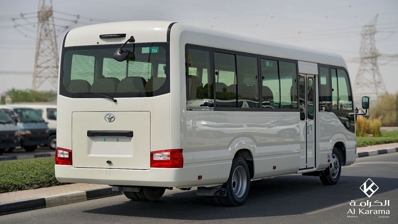 Toyota Coaster 2.7L | 23 Seater DLX | Automatic Door | Manual