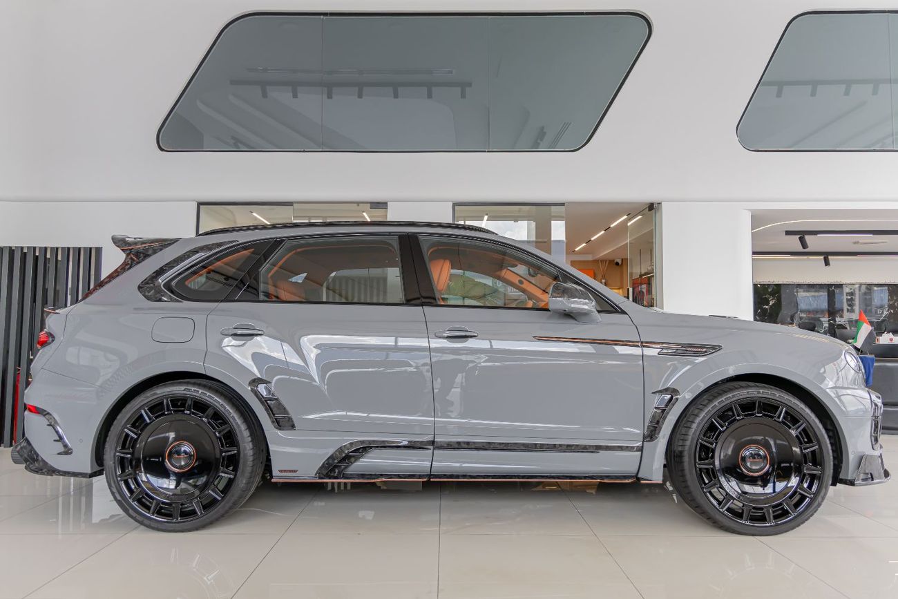Bentley Bentayga ORIGINAL MANSORY  Bentayga - Crystal-Cut Headlights, Carbonado Evo Bespoke Carbon Exterior - 2025