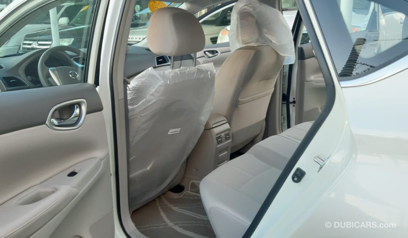 Nissan Sentra Gulf - agency condition - white paint inside beige in excellent condition, you do not need any expen