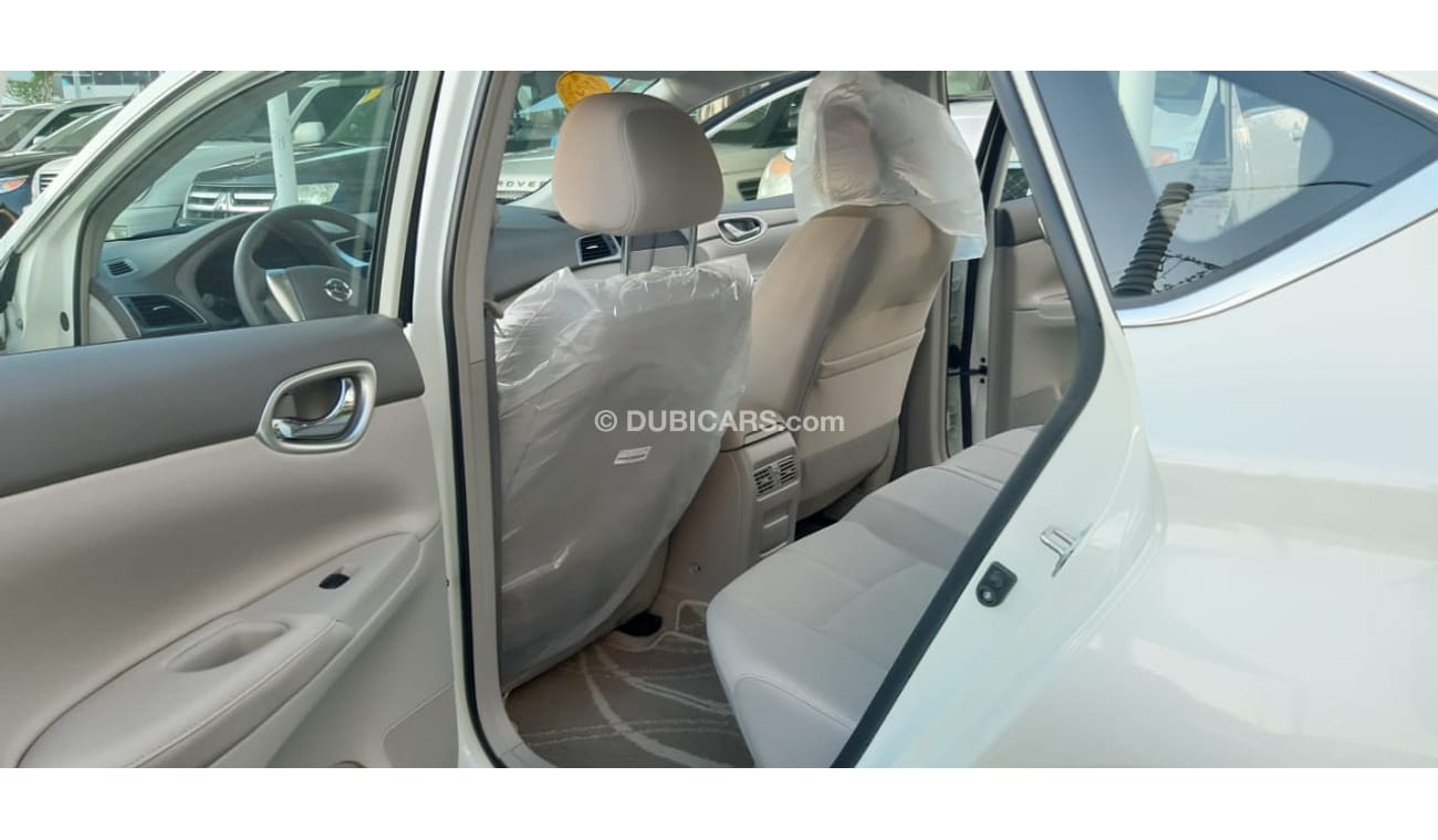 Nissan Sentra Gulf - agency condition - white paint inside beige in excellent condition, you do not need any expen