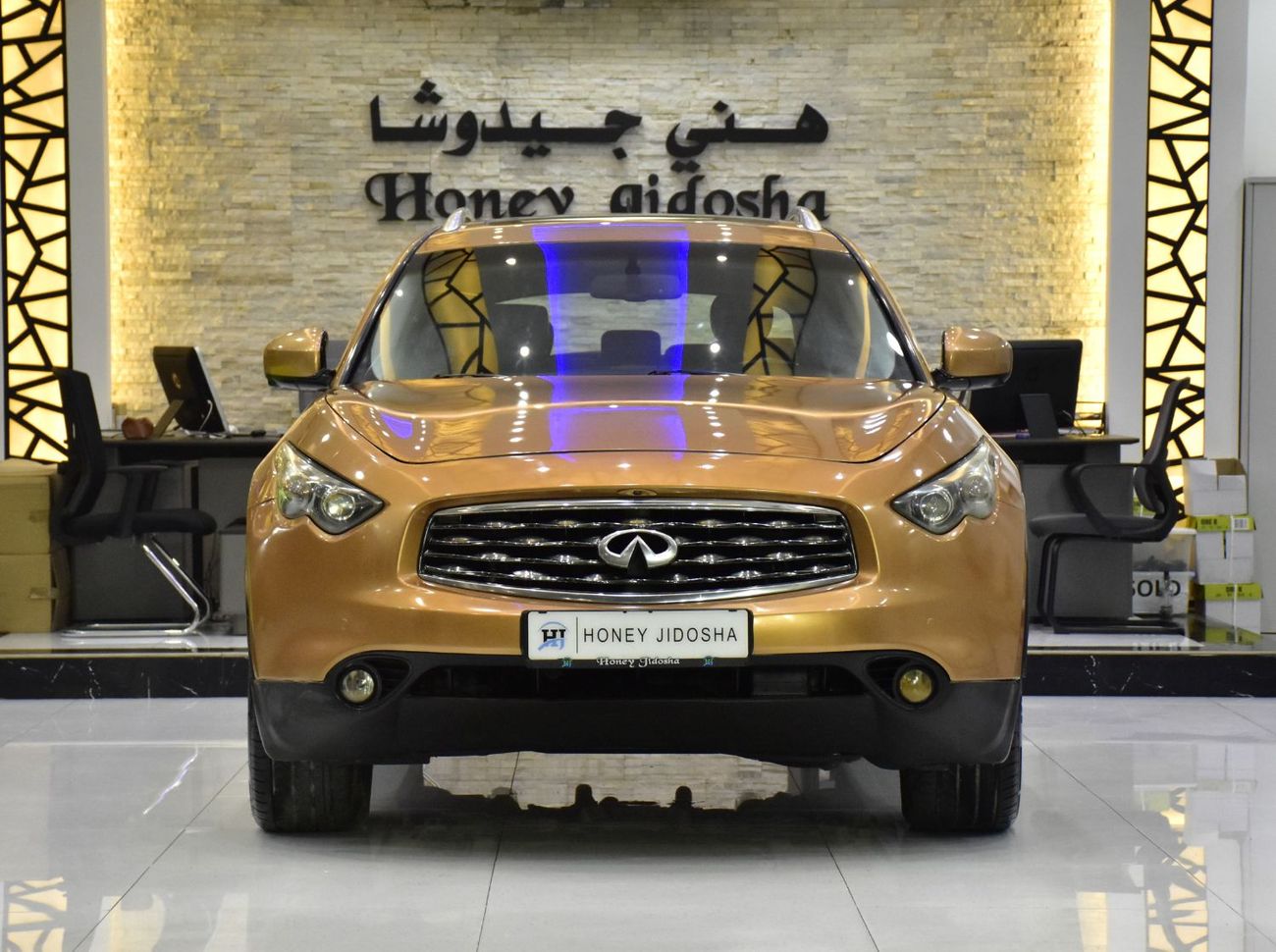 Infiniti FX50 EXCELLENT DEAL for our Infiniti FX50s ( 2009 Model ) in Orange Color GCC Specs
