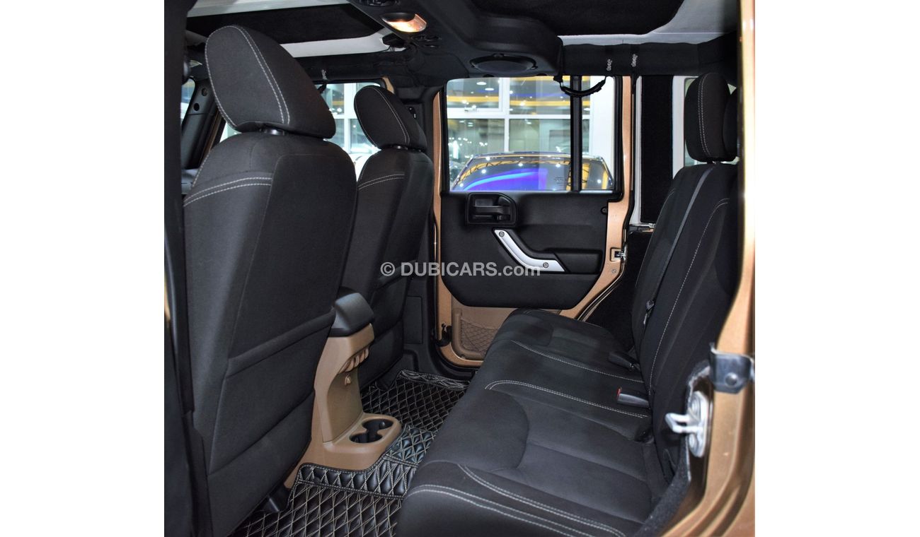 Jeep Wrangler Sahara EXCELLENT DEAL for our Jeep Wrangler UNLIMITED SAHARA 4x4 ( 2015 Model! ) in Brown Color! GCC