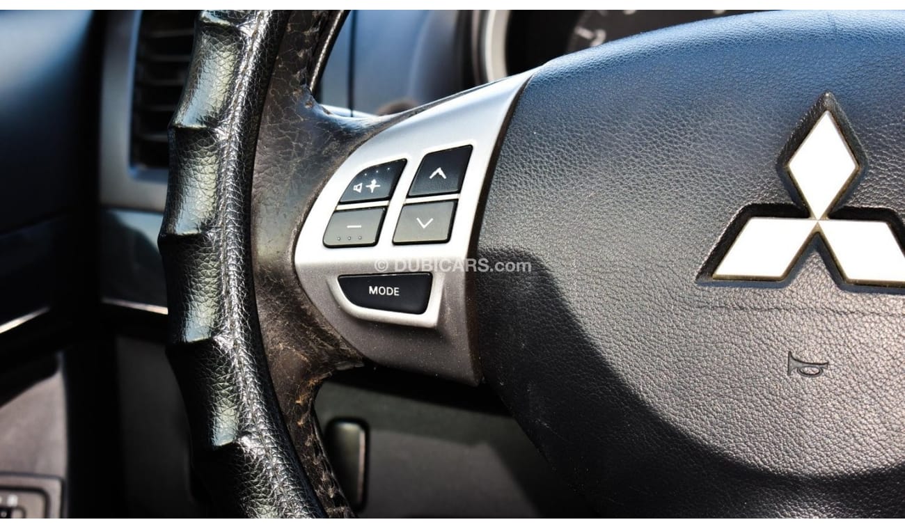 Mitsubishi Lancer 1600 CC, 2016 model, Gulf silver color, rear wing hatch, alloy wheels, FM radio, power conditioning,