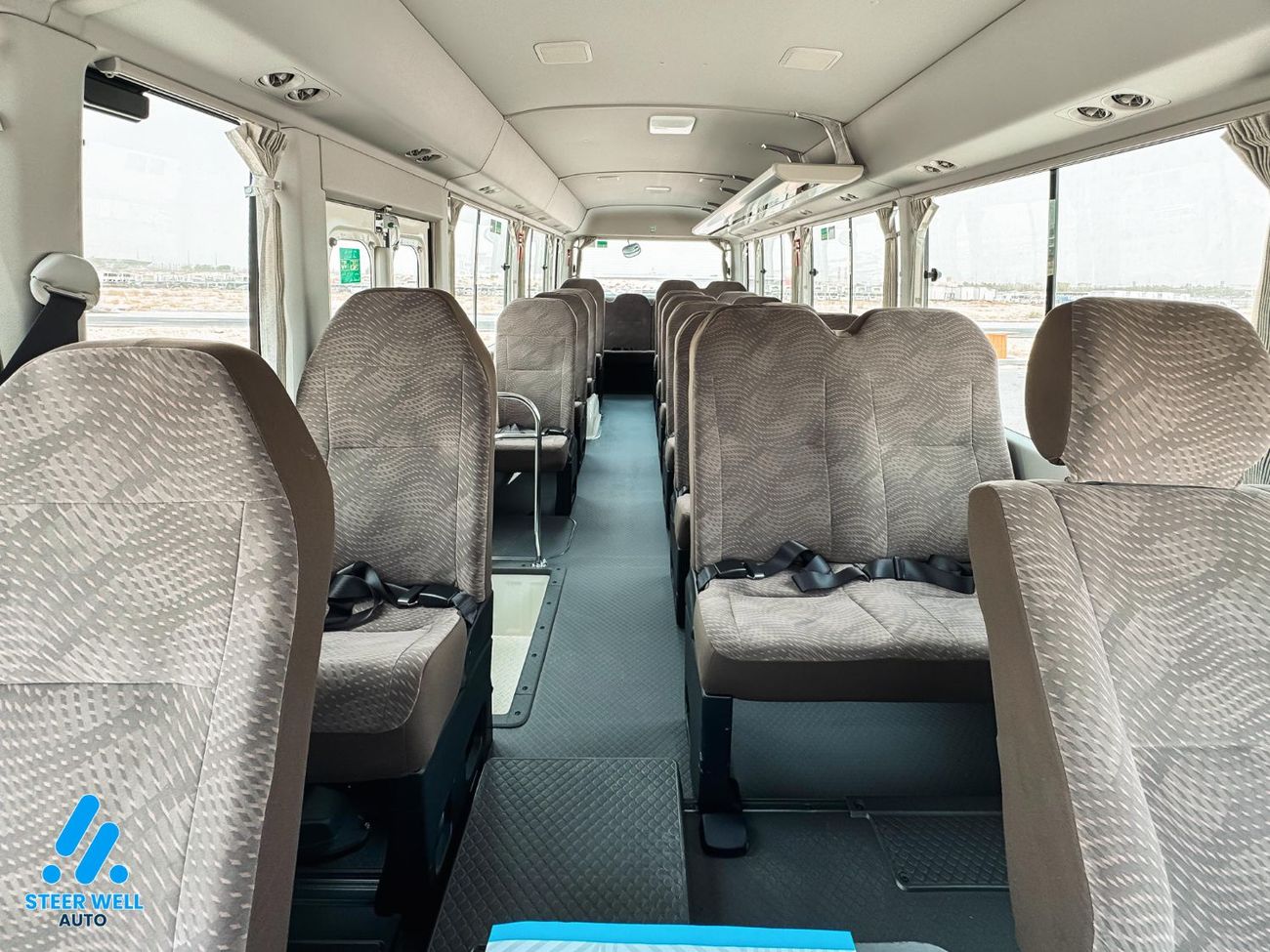 Toyota Coaster 23-Seater Bus 4.0L Diesel RWD GCC Specs Full Option White