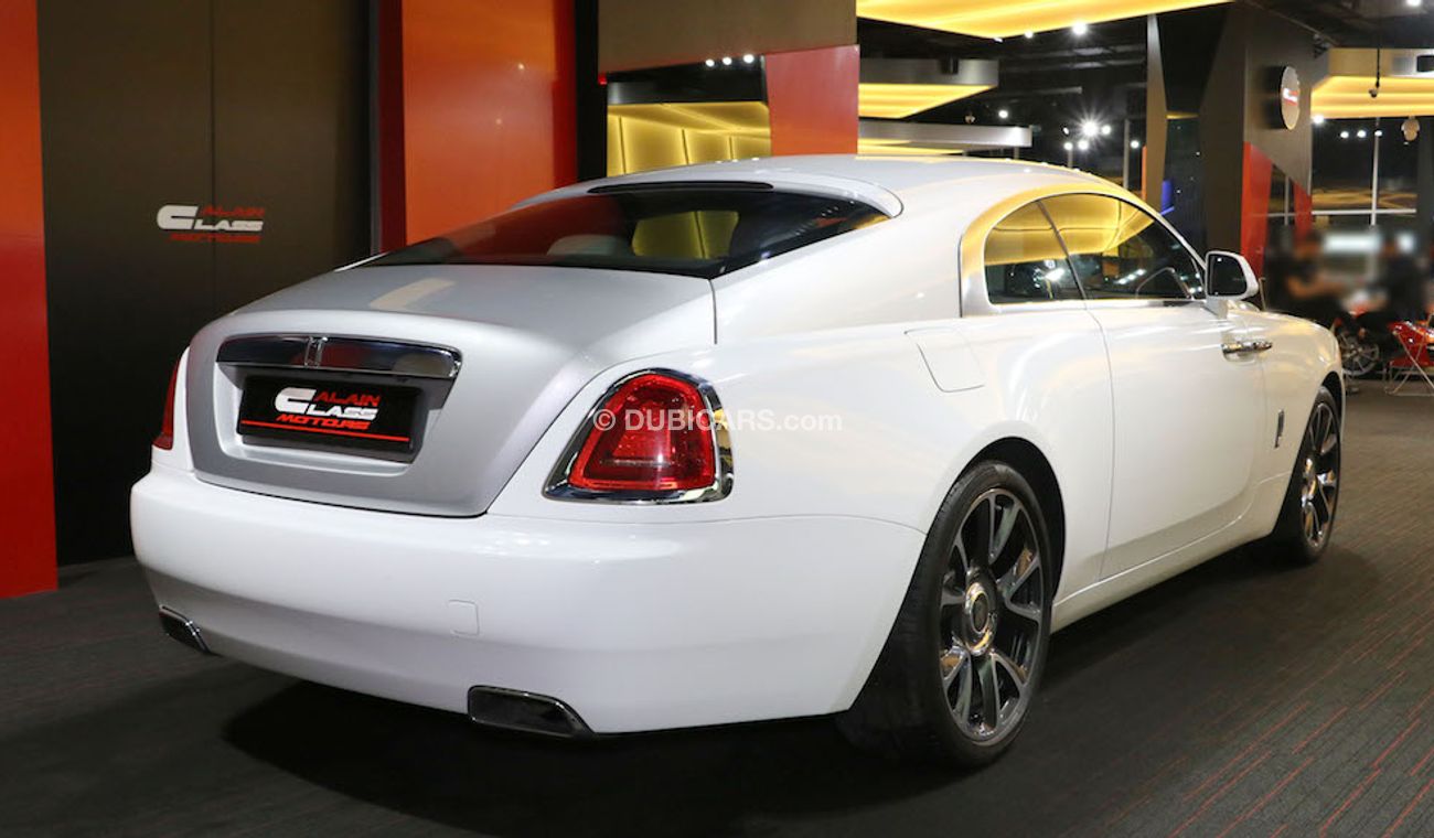 Rolls-Royce Wraith Original Color:  Brown | Silver  ( car with White Vinyl Sticker )