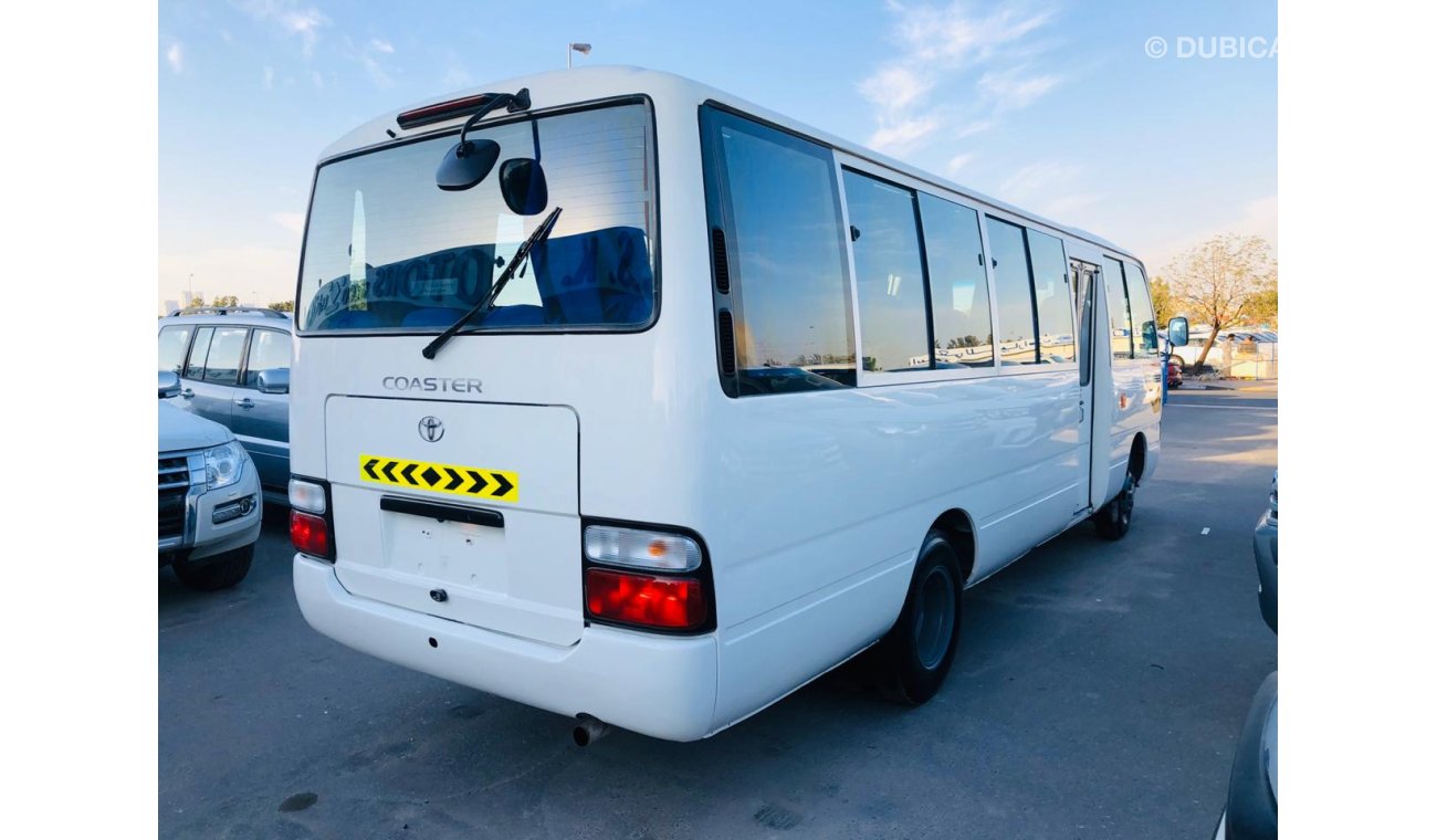 Toyota Coaster 4.2L Diesel, DVD + Rear Camera, Manual, MP3 Interface, DVD, CD Player, Tuner Radio, (LOT # TCB16)