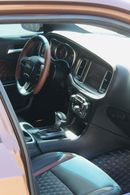 دودج تشارجر Unleash pure muscle with this Dodge Charger 2017, upgraded with an SRT body kit for an aggressive, h