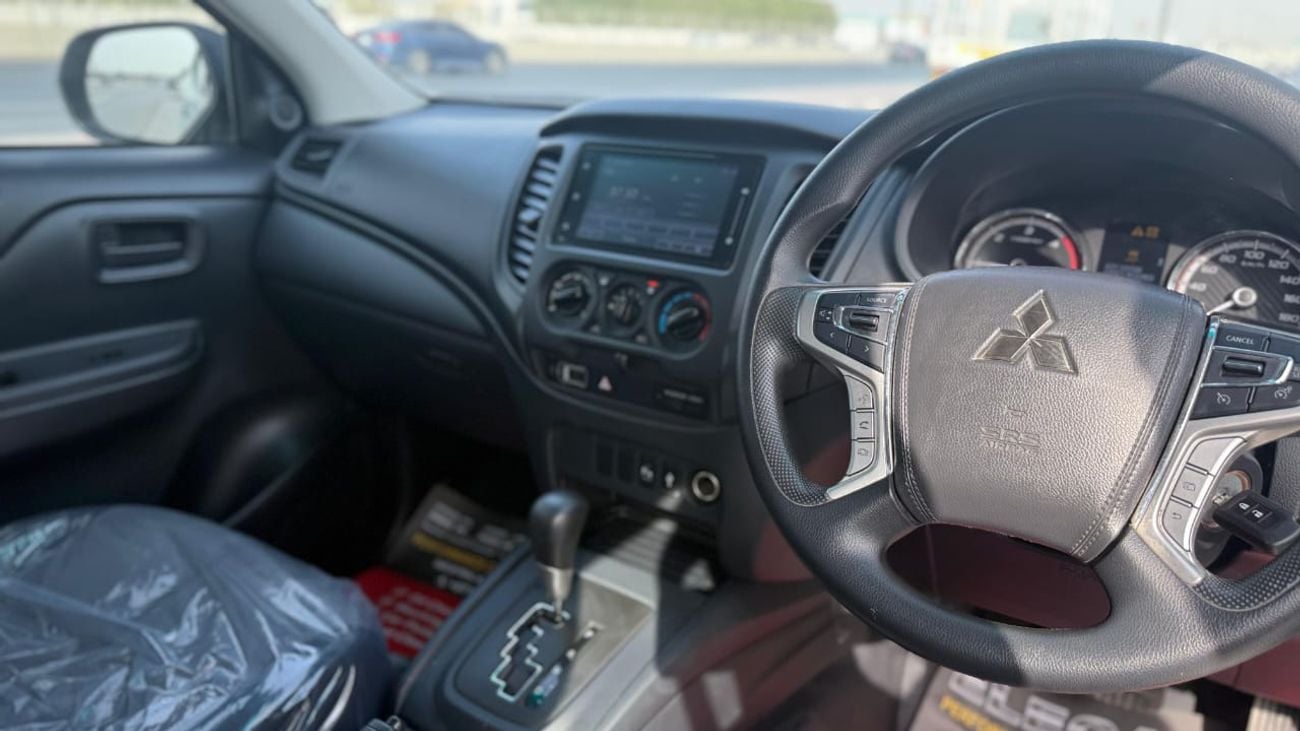 ميتسوبيشي تريتون DIESEL 2,4 LITER ,RIGHT HAND DRIVE ,2023 MODEL ,WHITE COLOR ,AUTOMATIC GEAR