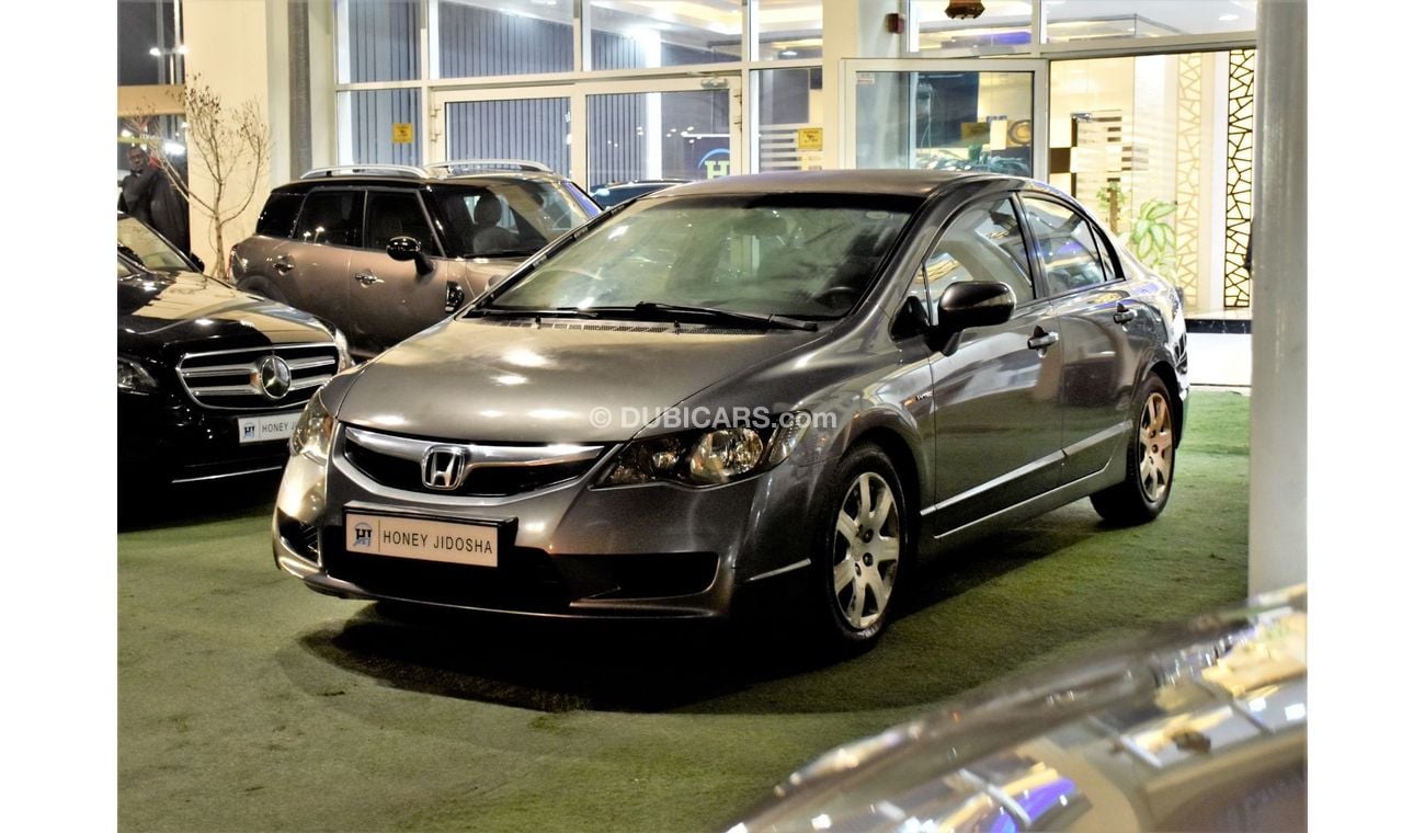 Honda Civic EXCELLENT DEAL for our Honda Civic 1.8 i-VTEC ( 2009 Model ) in Grey Color GCC Specs